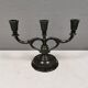 Three-armed candlesticks by Just Andersen, in Disco metal, Denmark, 1950s