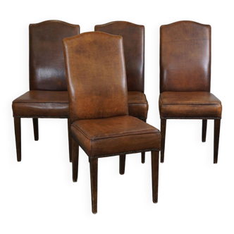 Set of 4 cognac-colored sheep leather dining chairs with a beautiful patina