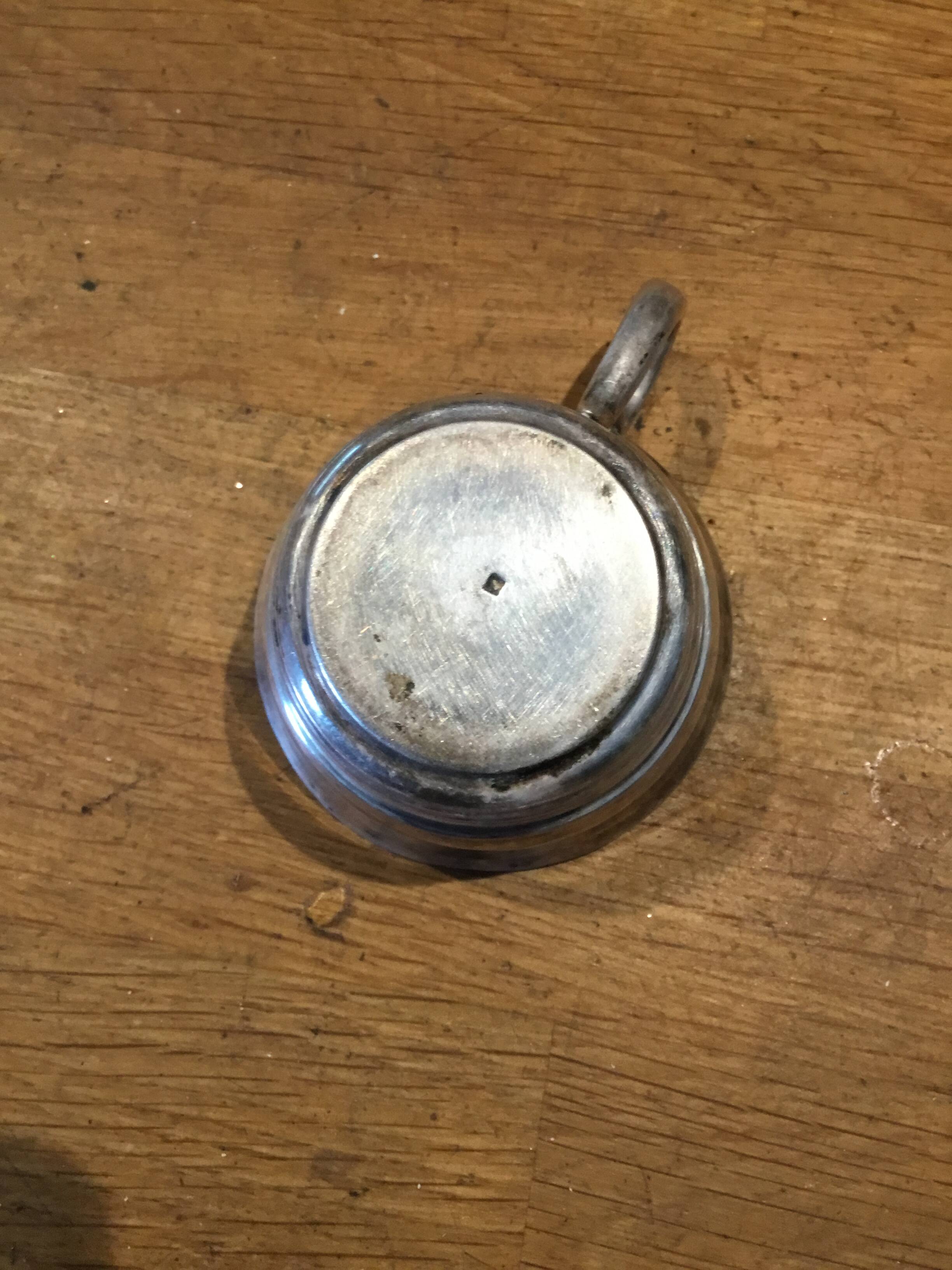small silver-plated metal cup
