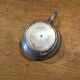 small silver-plated metal cup