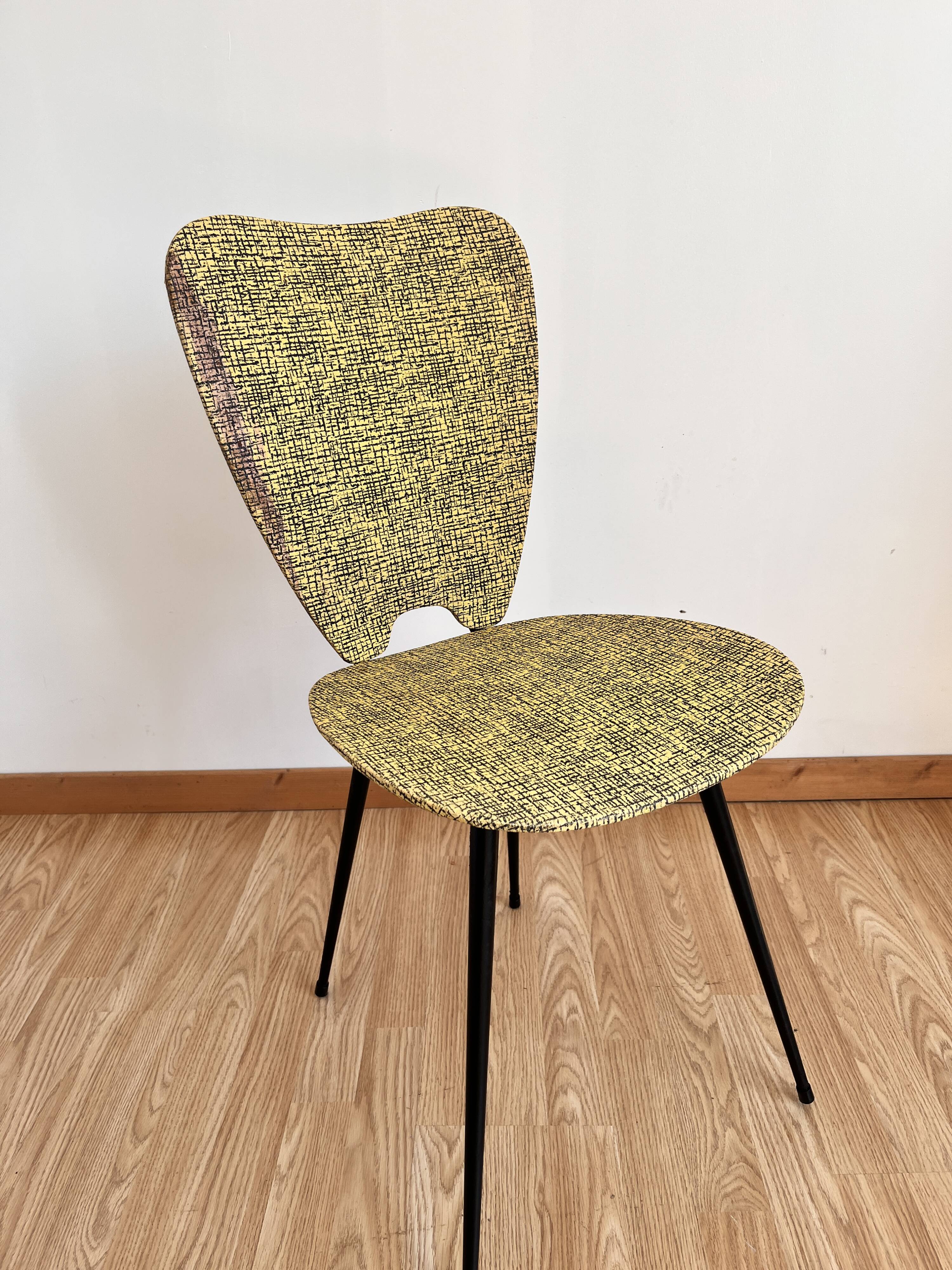 Faux leather chair assigned to Hitier.
