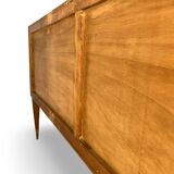 Veneered burl walnut chest of drawers with light warm brown glass top