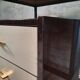 Vintage lacquered top desk with iron structure and pointed brass feet