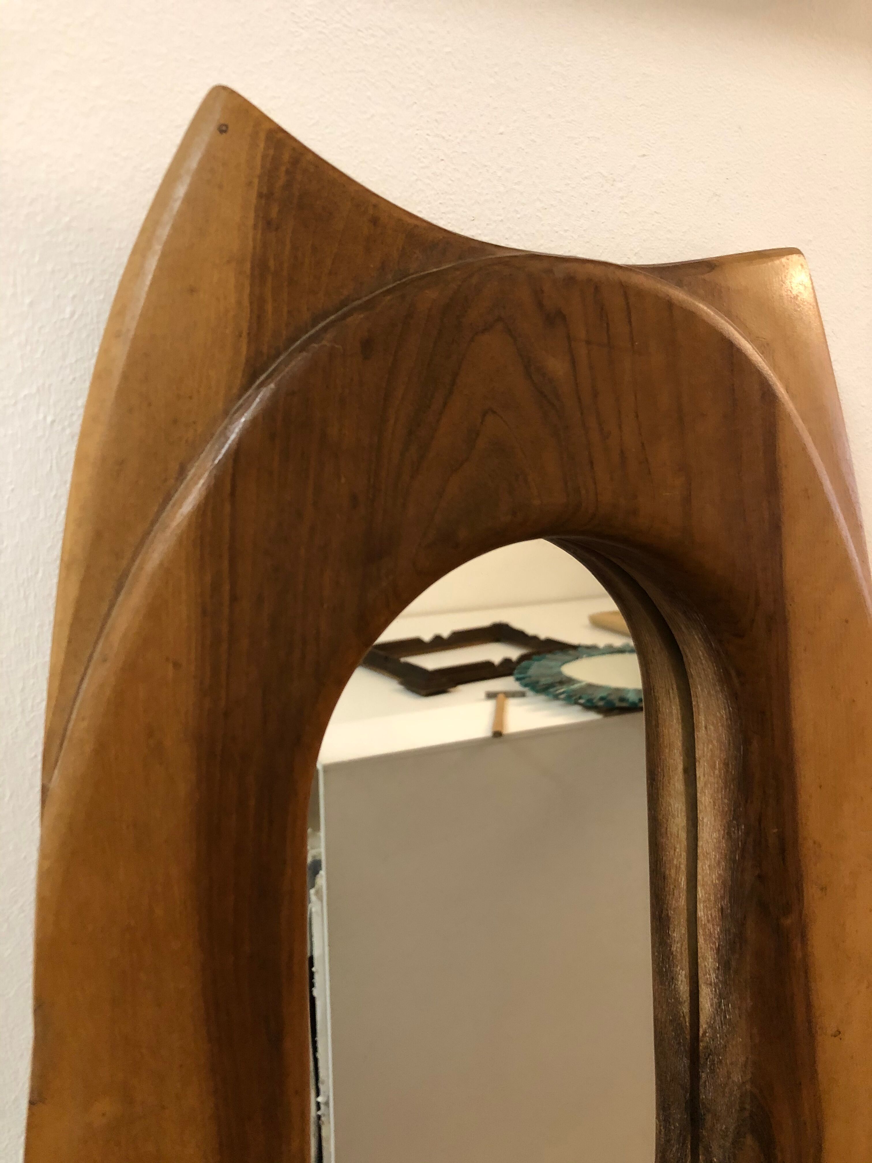 Oval mirror carved in olivier wood 1960