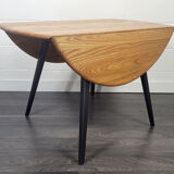 Ercol round drop leaf dining table - black leg, 1960