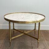 Neoclassical style round coffee table in brass with a white Carrara marble top from Jansen