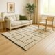 Beige Berber rug with structured lines.