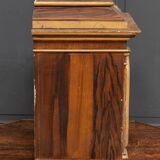 18th century tabernacle decorated with 2 columns and a sun on the facade