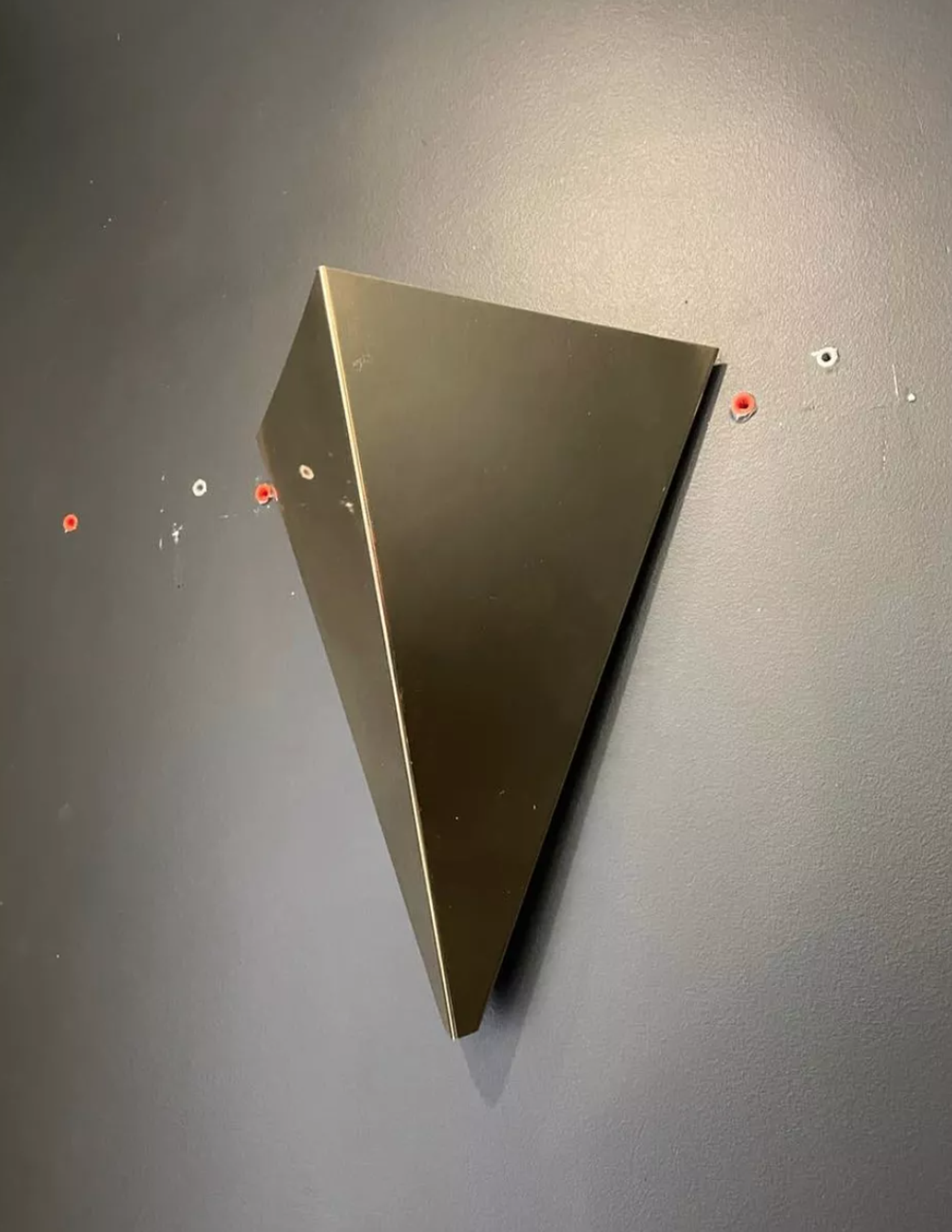 Pair of geometric vintage wall lamps in solid brass, France 1970.
