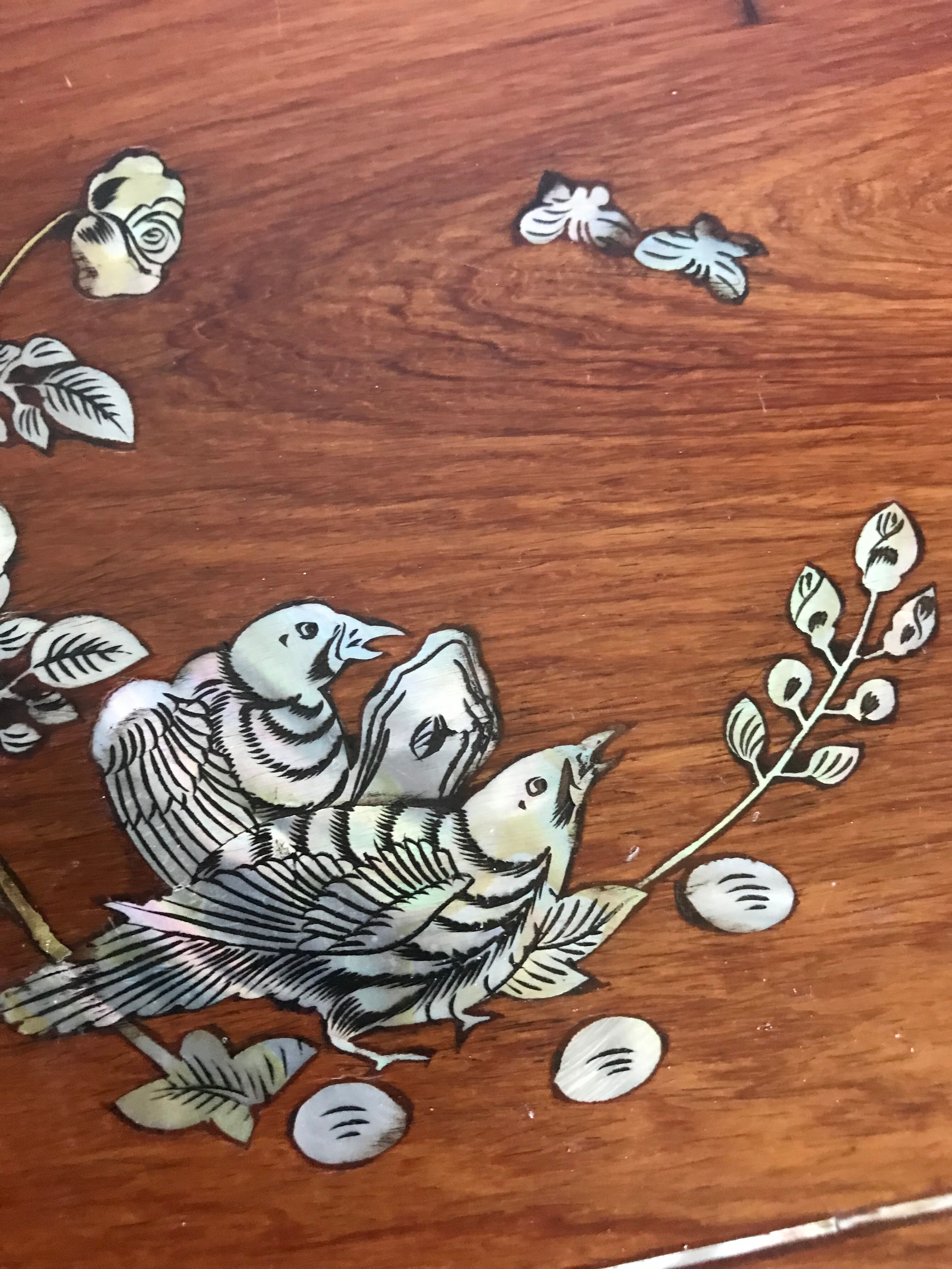 Wood and mother-of-pearl top