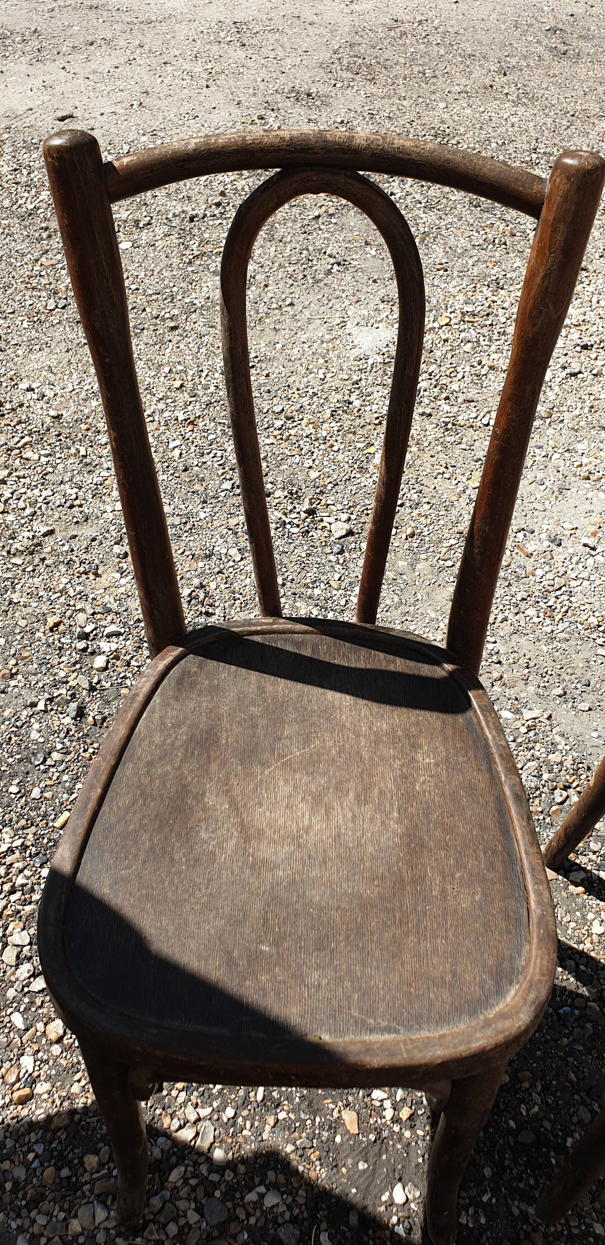 Pair of curved wood bistro chairs