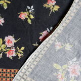 Black tablecloth with bouquets of roses