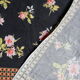 Black tablecloth with bouquets of roses