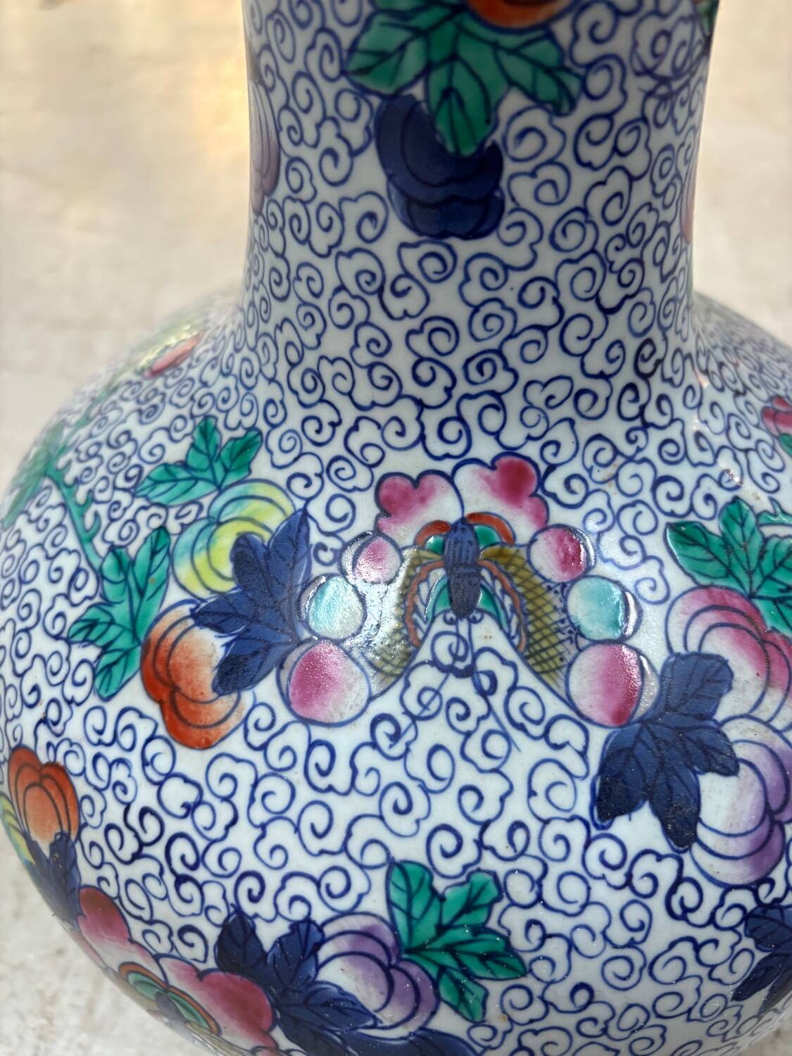 CHINA Polychrome porcelain vase decorated with butterflies Signed under the base 43cm