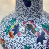 CHINA Polychrome porcelain vase decorated with butterflies Signed under the base 43cm