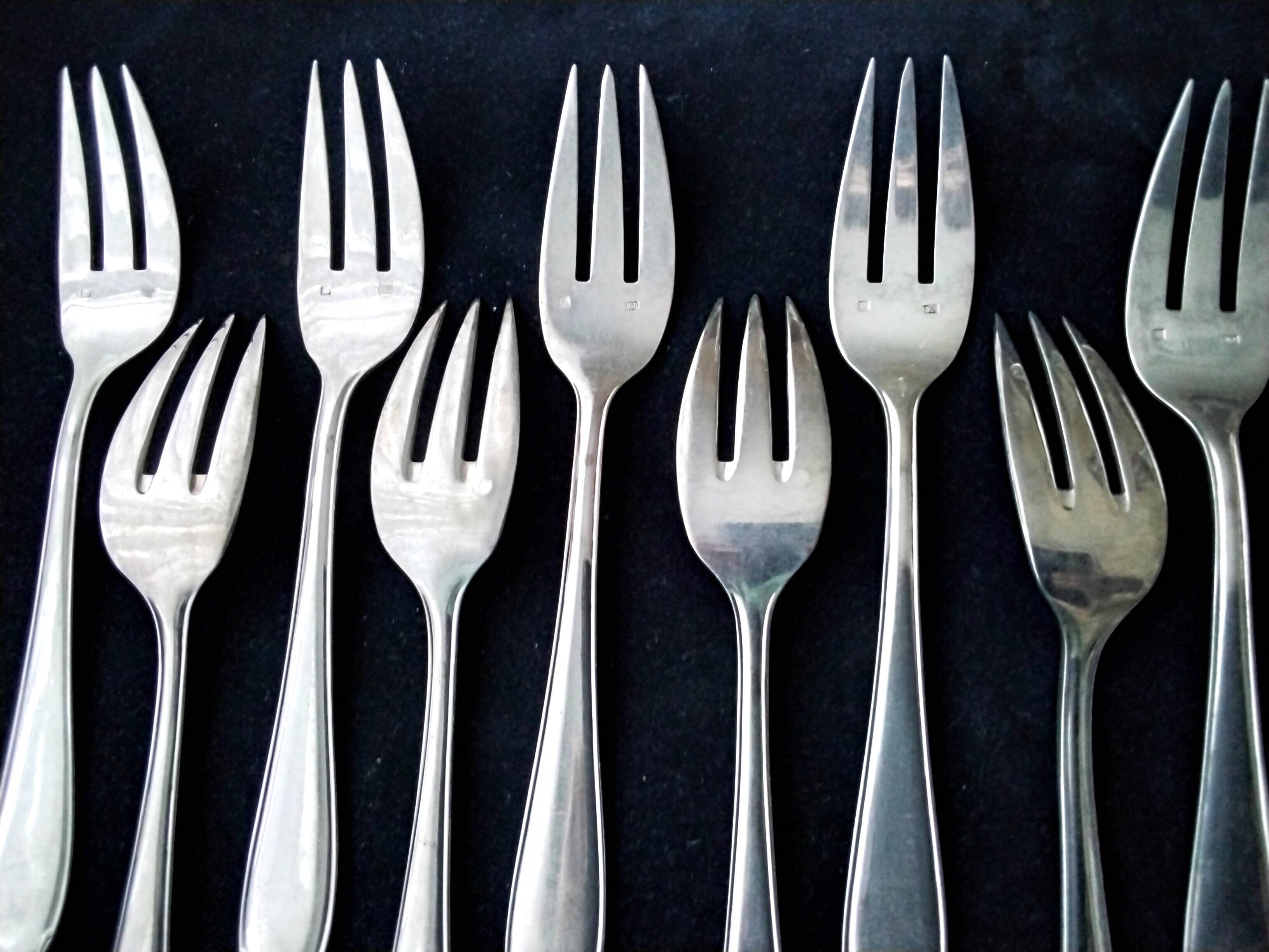 10 silver-plated fish forks