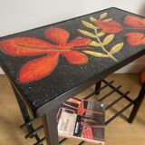 Side table or end of sofa in wrought iron and enamelled lava stone circa 1960