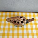 Alpho earthenware spikes in the shape of a watering can