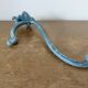 Old blue enamelled cast iron coat hook