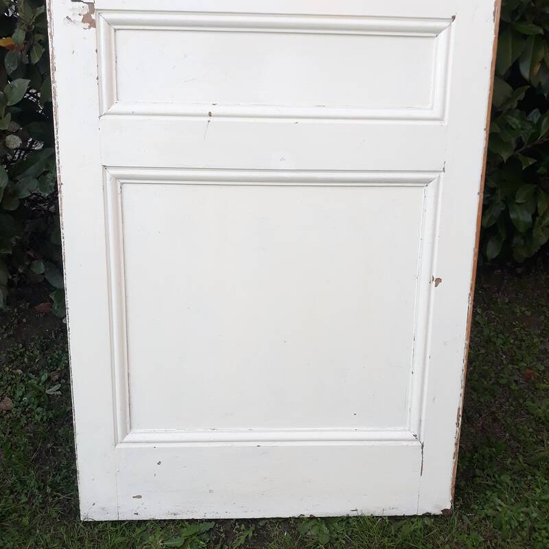 Communication door H220xW80.5cm, old panelled with moulding.