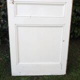 Communication door H220xW80.5cm, old panelled with moulding.