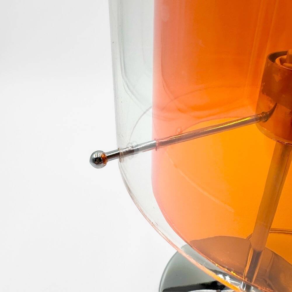 Orange and chrome plexiglass lamp from the 90s.