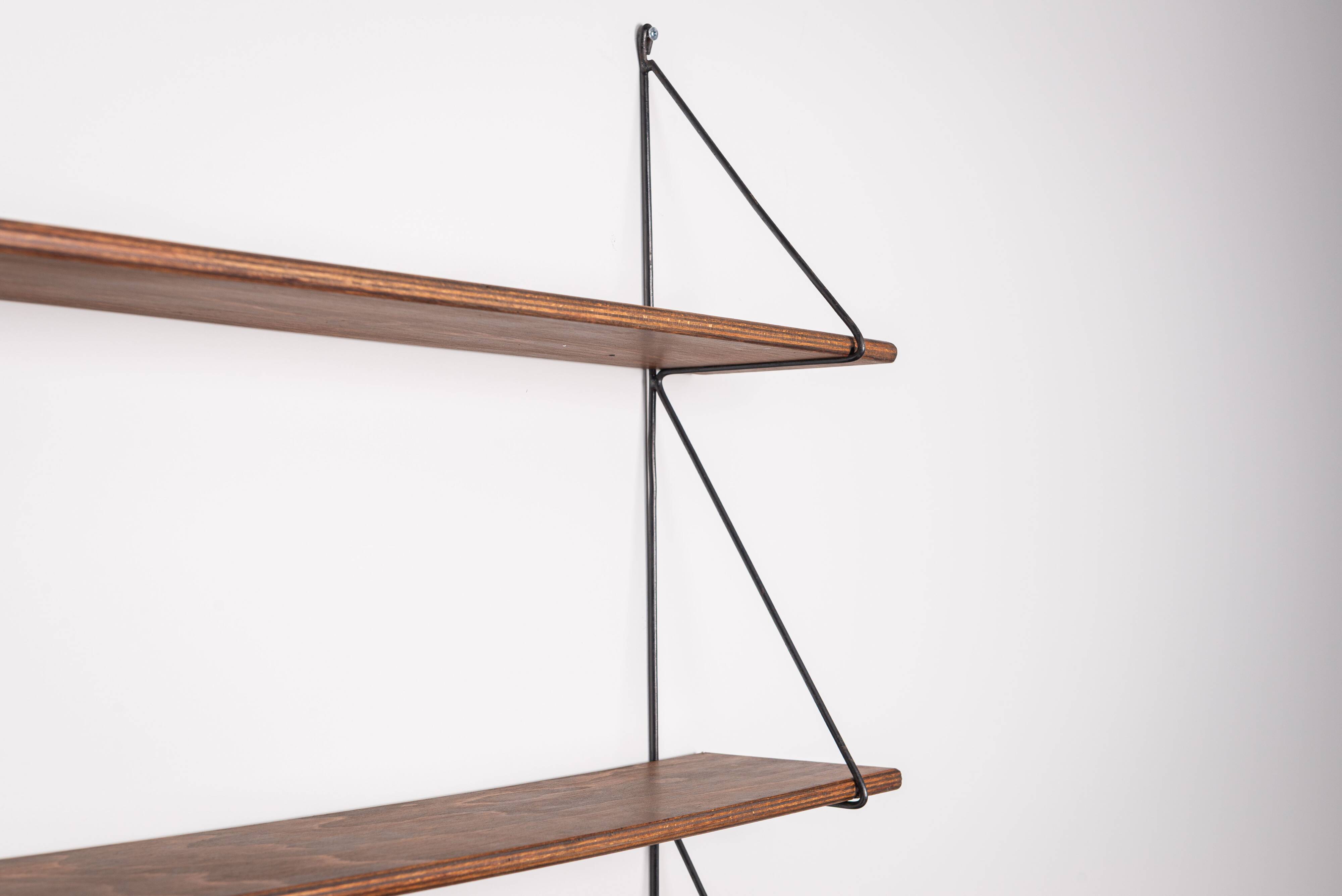 Set of minimalistic wooden shelving units