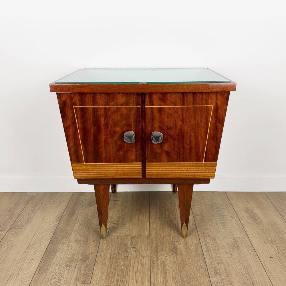 1950s bedside table in varnished wood veneer and brass.
