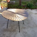Round coffee table in vintage rattan