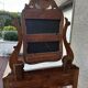 Walnut and marble dressing table, mercury mirror, circa 1850.