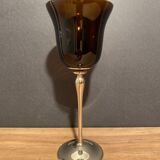 Photophore in tinted glass on high metal foot with silver patina