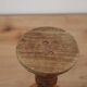 Turned and carved wooden candlestick with foliage decoration – H 20 cm