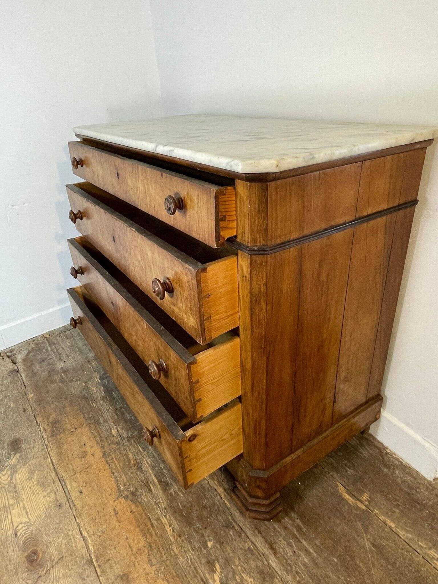 Antique walnut commode with marble top, 19th century.