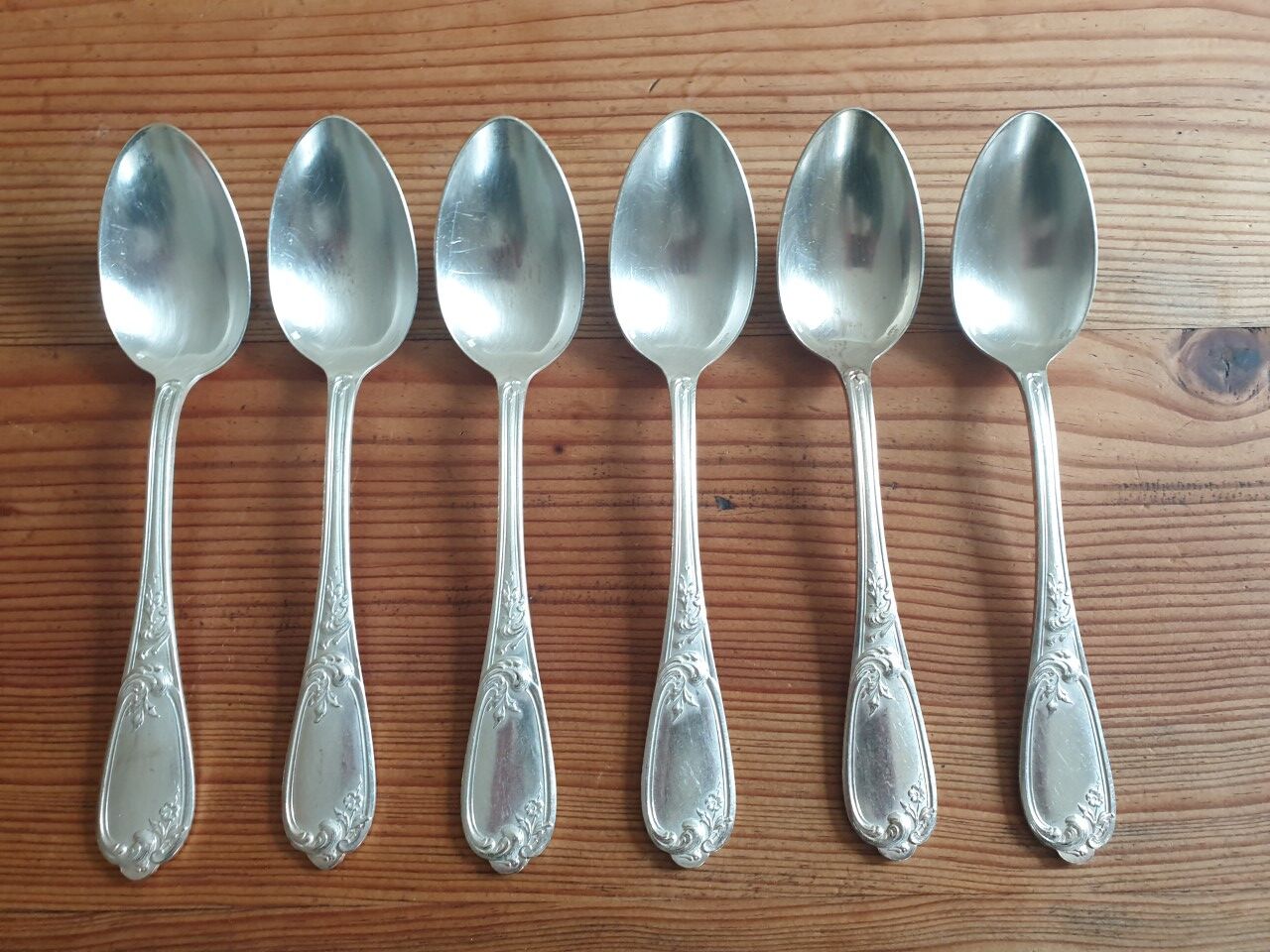 Old silver metal spoons