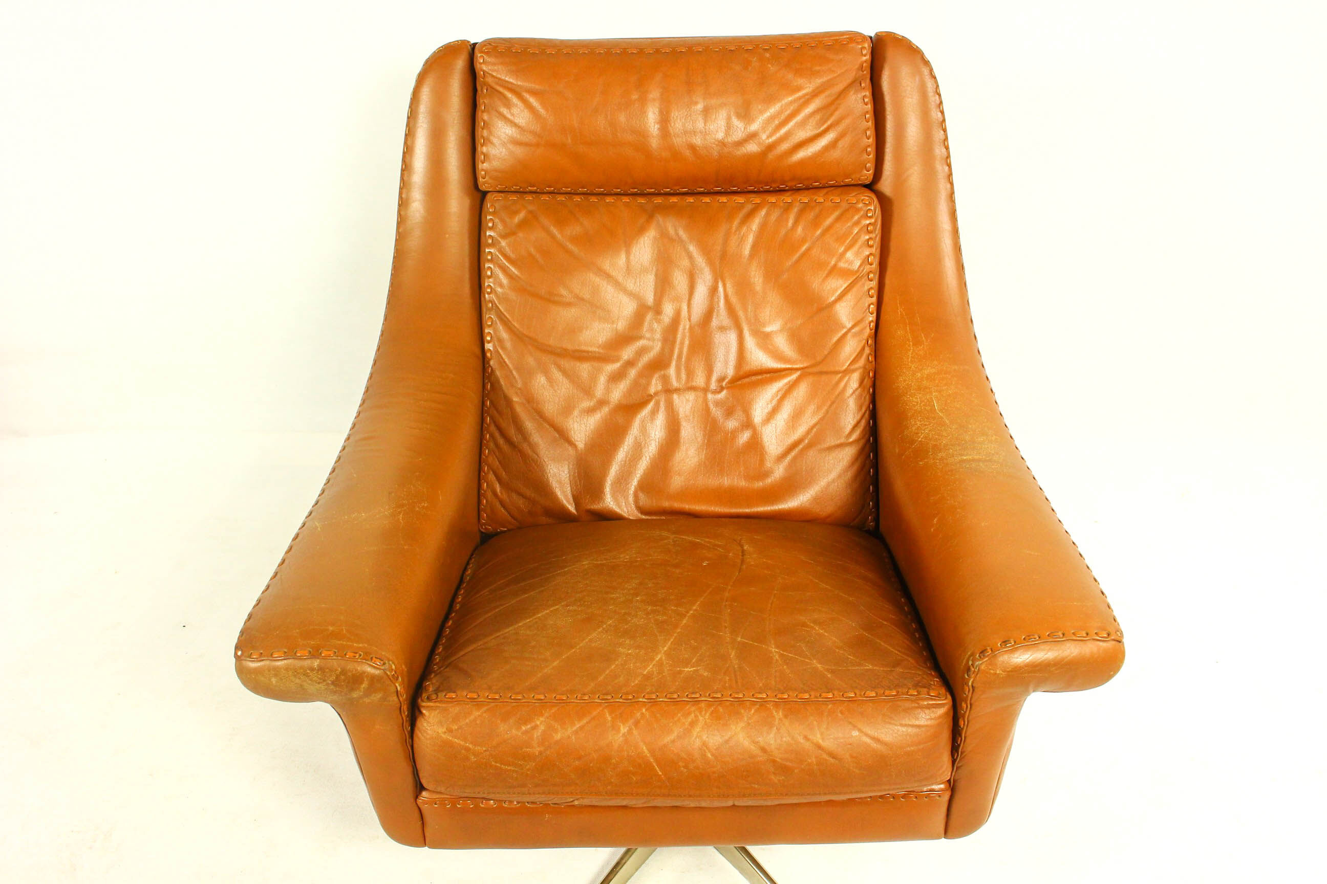 Matador swivel leather chair with ottoman by Aage Christiansen for Erhardsen & Andersen, 1960s