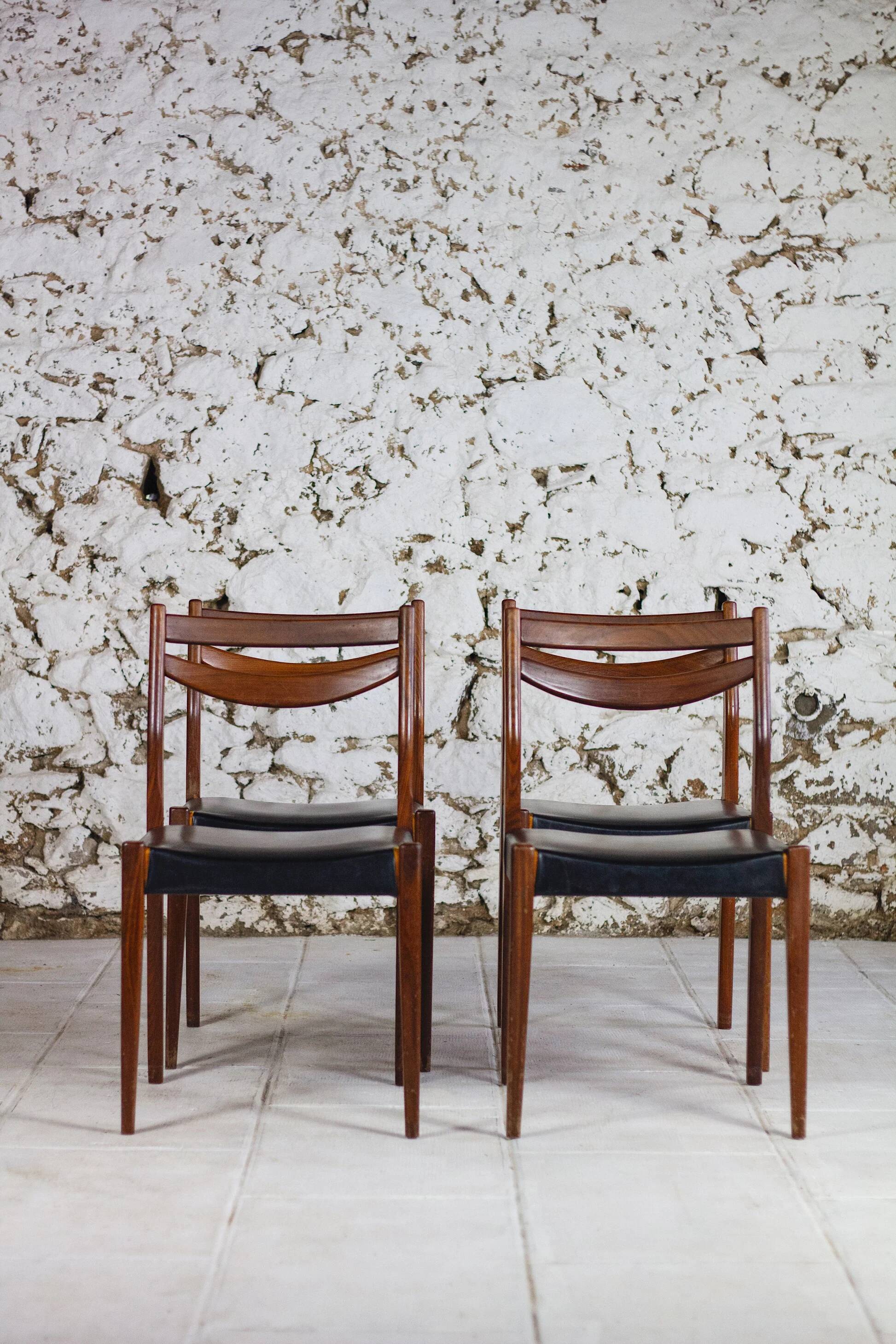 4 vintage Scandinavian chairs in teak and imitation leather, 1960