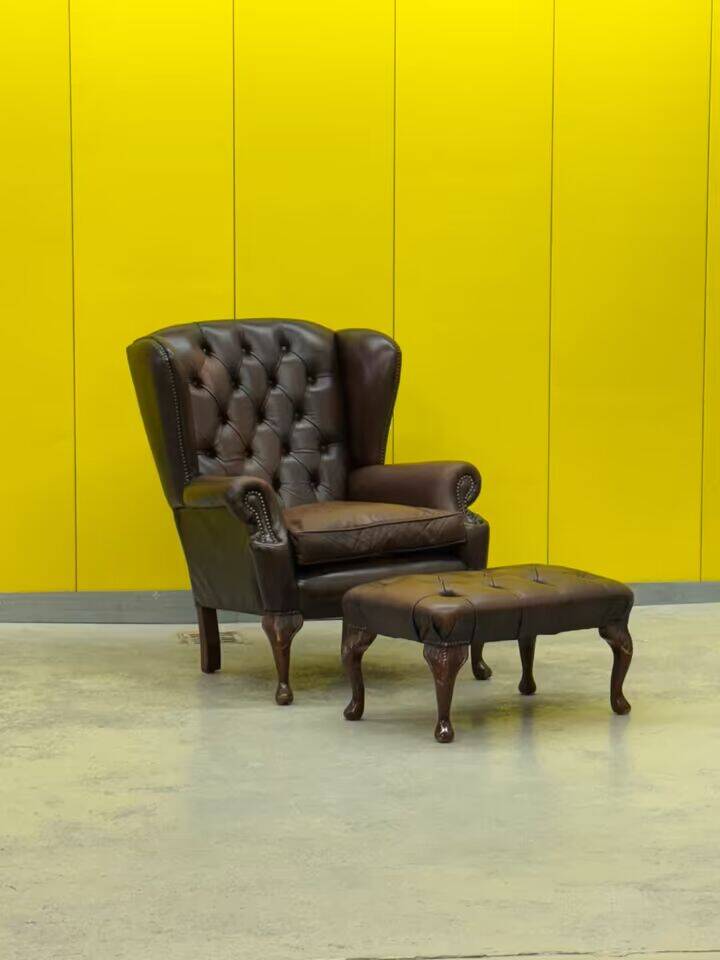 Dark Brown leather chesterfield wing chair with Ottoman