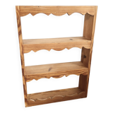 Scalloped frieze wall shelf
