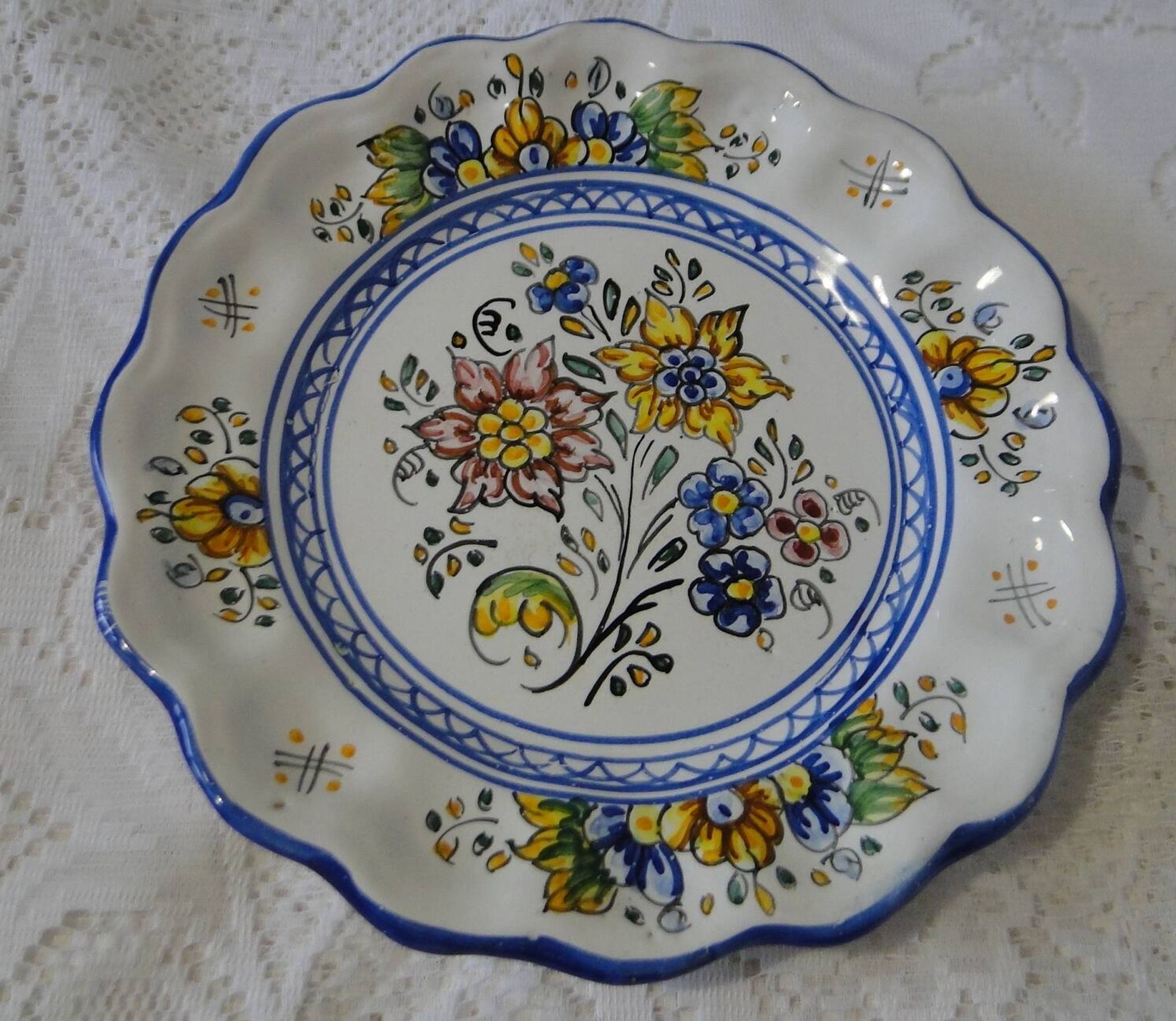 Decorative earthenware plate with floral Talavera decoration
