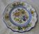 Decorative earthenware plate with floral Talavera decoration