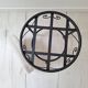 Black iron stool/pouf with its boucle fabric cushion.