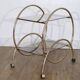 Glass and gold metal rolling trolley 1970