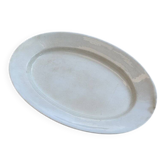 Large oval cream serving platter in ceramic - vintage model from the 1950s, wide rim.