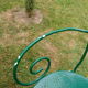Wrought iron garden lounge table and 2 armchairs