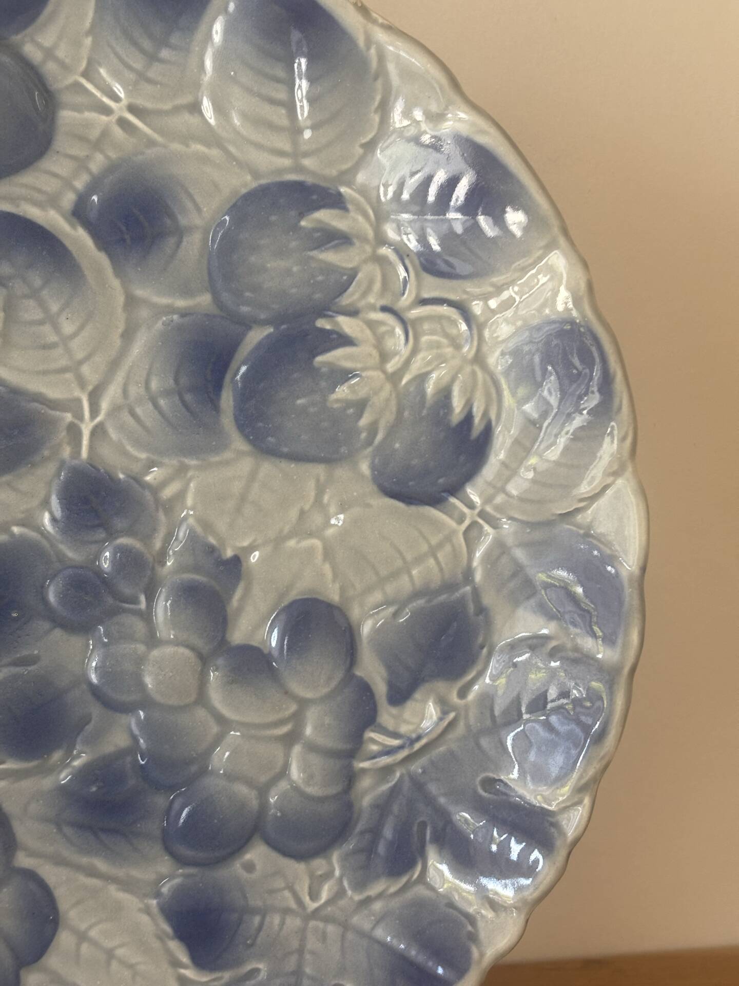 Old slightly hollow dish barbotine blue fruit Sarreguemines