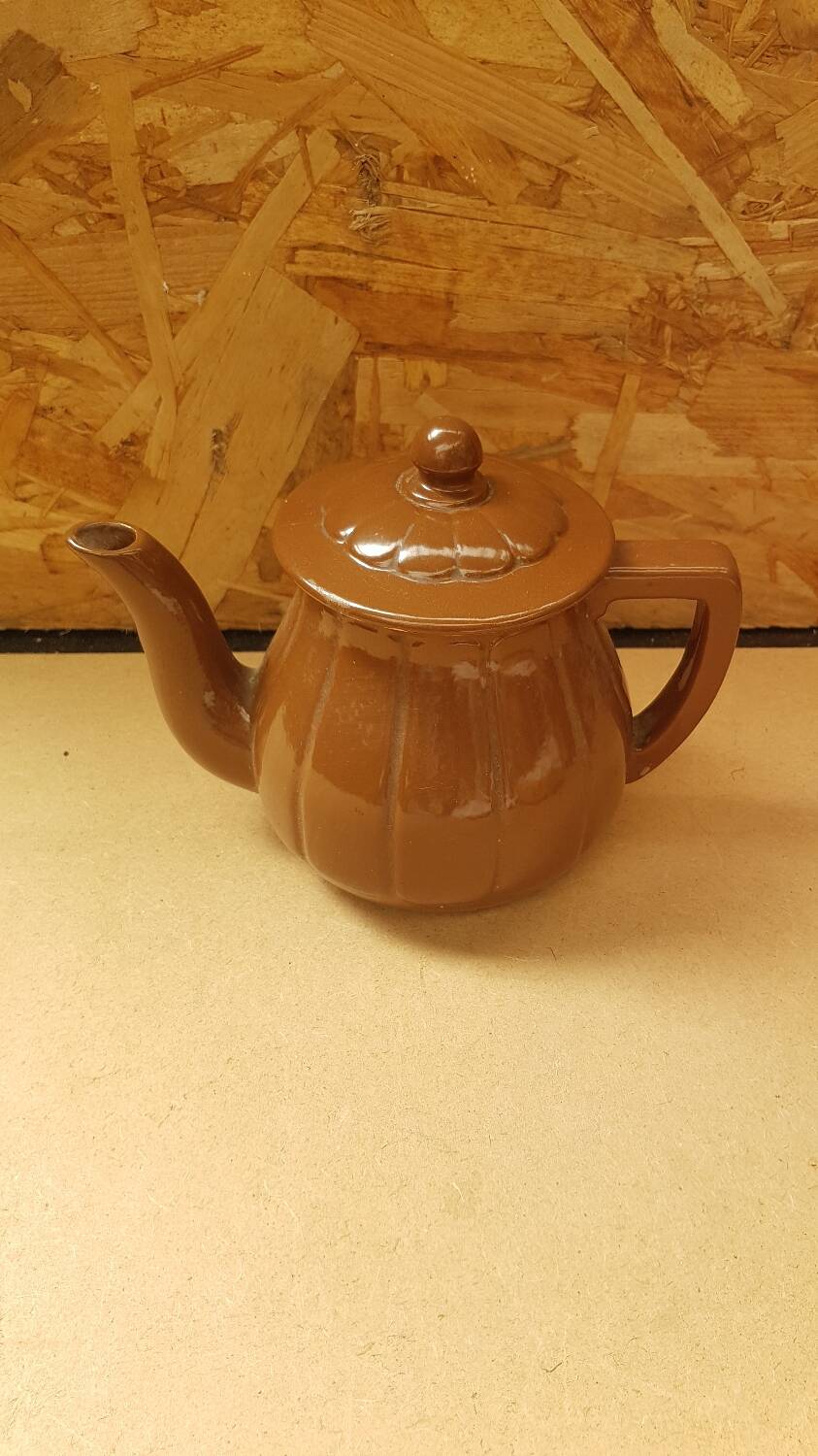 Old vintage brown ceramic romeo teapot