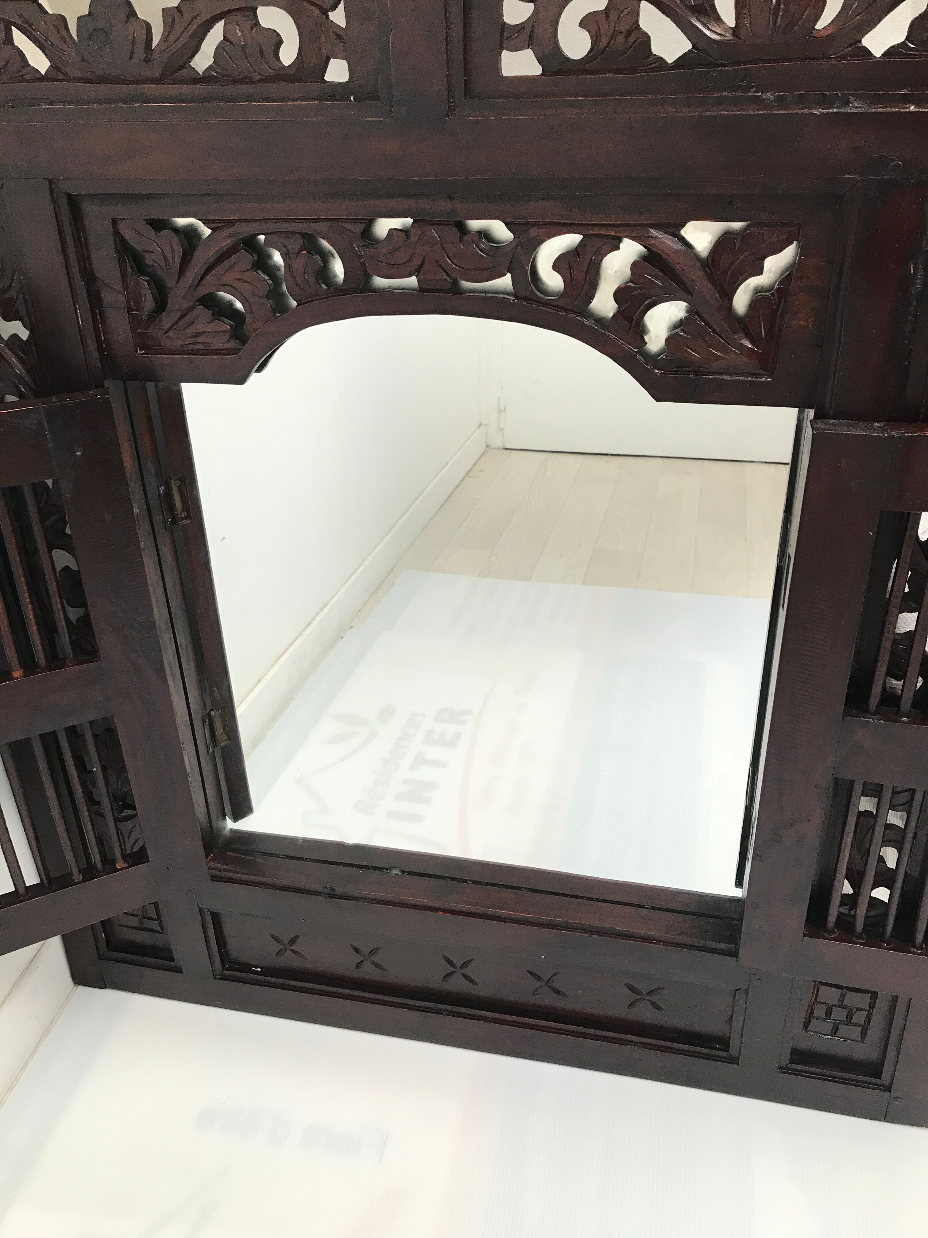 Vintage shuttered Indonesian mirror