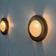 Pair of round glass wall lights, brass base and Wood Wood, 1960s, Italy.