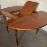 Scandinavian round teak dining table from the 60s extendable