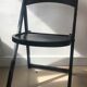 Black folding chair